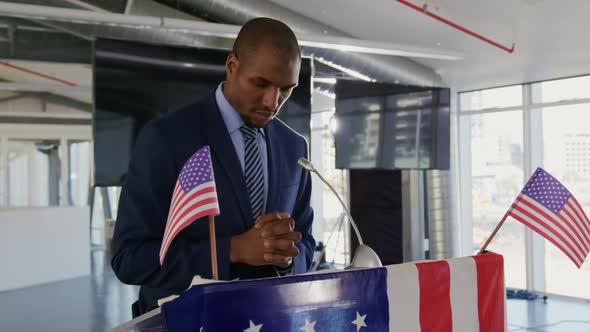 Male speaker addressing audience at political convention