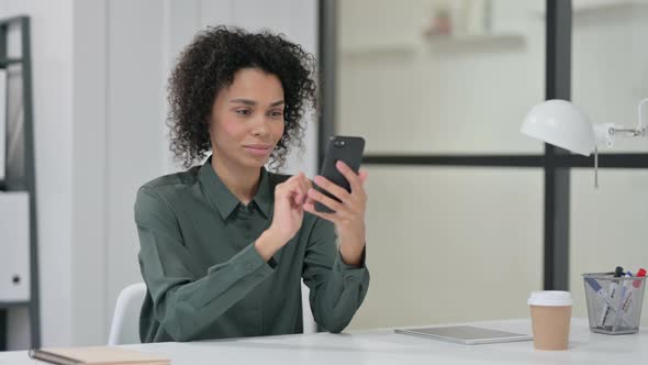 African Woman Using Smartphone Work