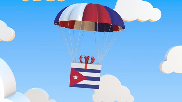 Box with National Flag of Cuba Falls with a Parachute