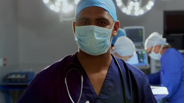 Male surgeon standing at hospital 4k