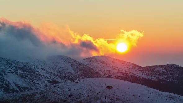 Colorful Light of Sunset Evening Over Winter Alpine Mountains