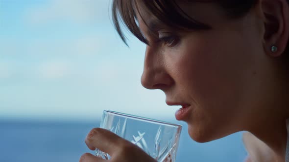 Beautiful Woman Drinking Whiskey Closeup