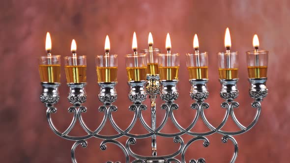 Olive oil candles with orthodox jewish light a hanukkah menorah
