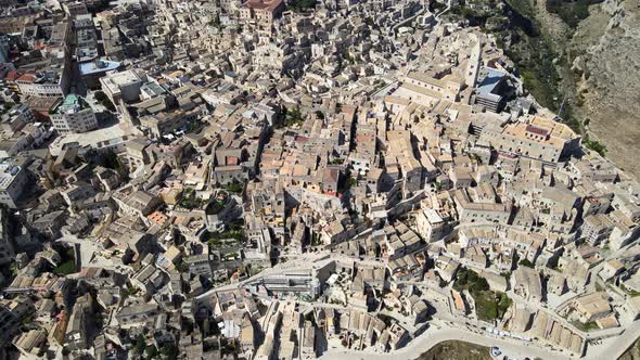 Aerial drone top shot showing the whole town of Matera, Italy. The oldest ancient city in Europe.