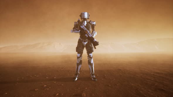 Futuristic Soldier in Desert at Sandstorm alt