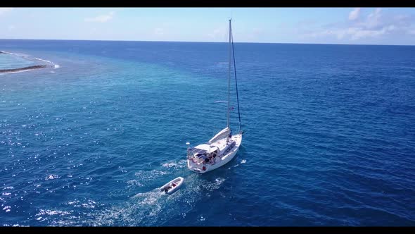 Aerial view abstract of exotic resort beach voyage by shallow lagoon with white sand background of j