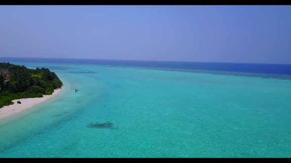 Aerial drone view sky of luxury shore beach lifestyle by blue water and white sand background of a d