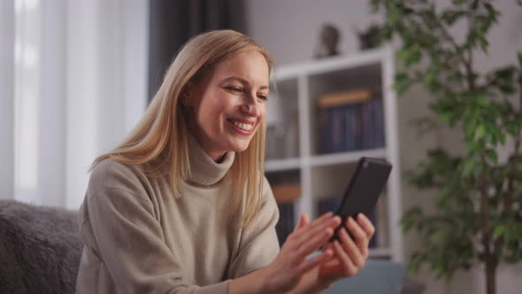 Woman Having Videochat on Smartphone