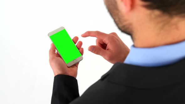 Business executives using mobile phone