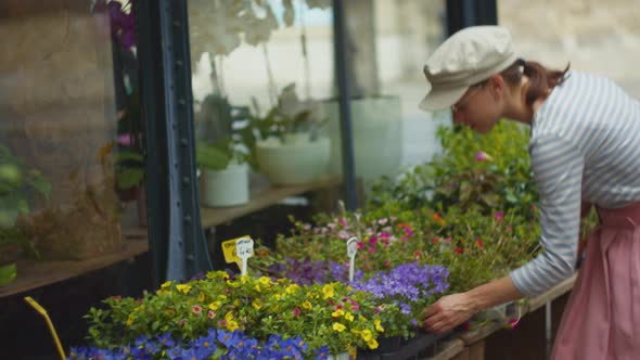 Young woman in a flower shop