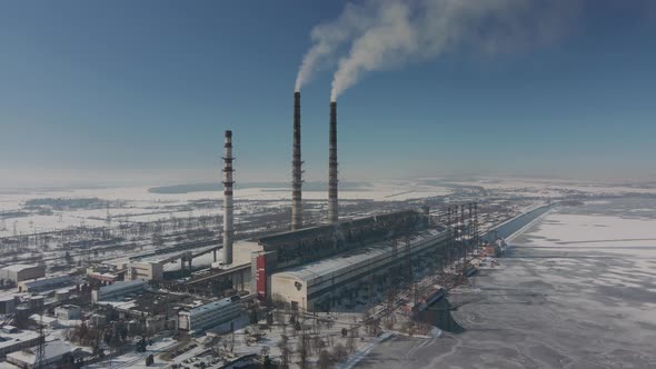 Aerial View of High Chimney Pipes with Grey Smoke From Coal Power Plant