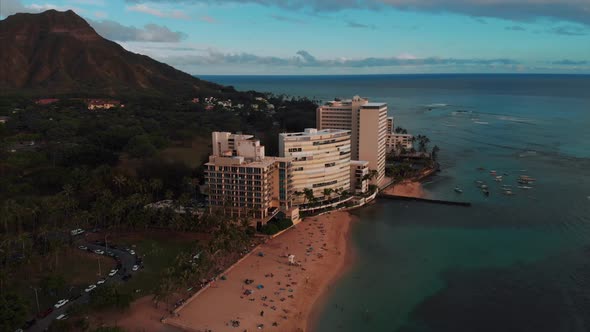 Aerial drone footage of Honolulu, Hawaii. Beautiful real estate, buildings in the city. Palm trees