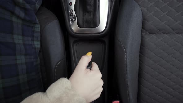 Driver woman controlling automobile