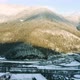 Beautiful footage of aerial Drone  view of train in winter forest mountains - VideoHive Item for Sale