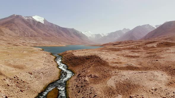 Aerial View of Lake Rounded Mountain Chain