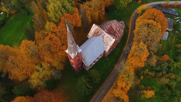 Aerial view of an old church in the middle of a village, Estonia.