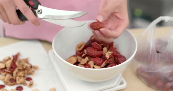 Cutting red jujube for making dessert at home