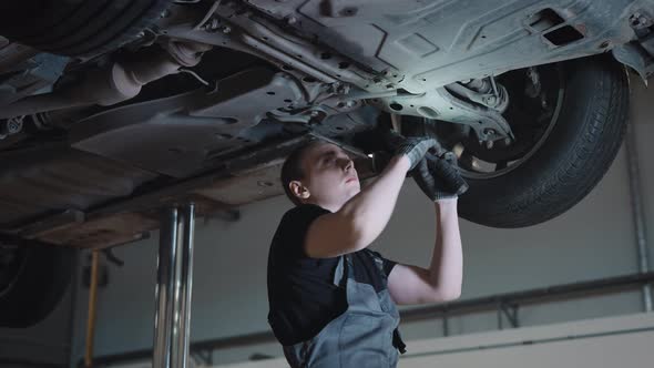 Car on a Lift in a Specialized Service