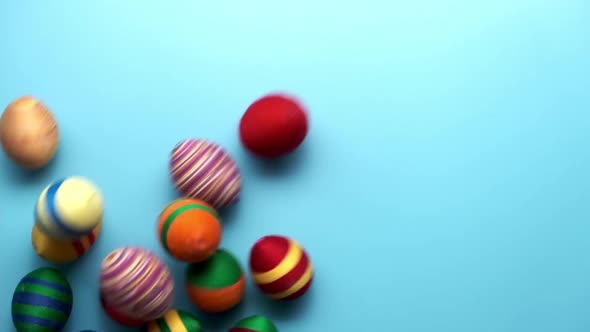 Colorful Easter Egg Made From Threads Isolated on Blue Background