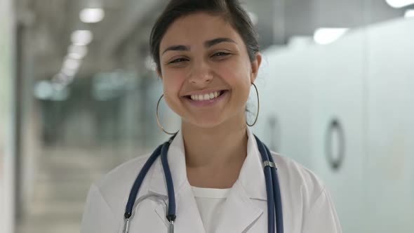 Portrait of Indian Female Doctor Saying Yes By Shaking Head