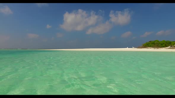 Aerial top down panorama of marine tourist beach wildlife by transparent sea and white sand backgrou