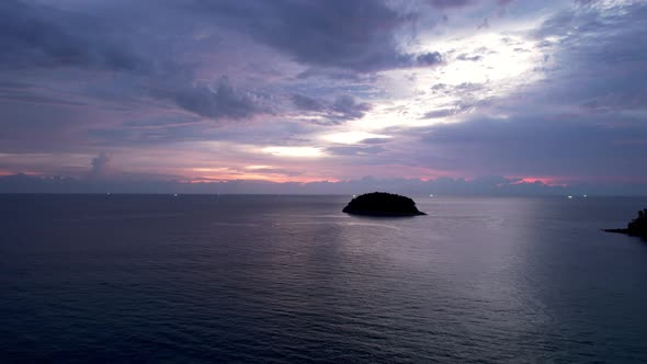 Purple Sunset with a View of the Sea and Clouds