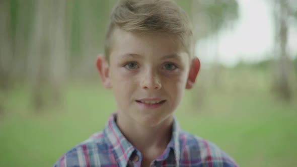 Boy smiling cheerfully, portrait