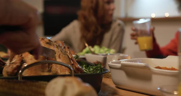 Millennial adult friends celebrating Thanksgiving together at home 4k