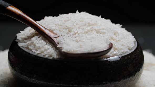 Rice Grain In Bowl And Spoon Rotate