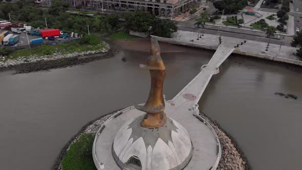 Close-up aerial shot of Kun Iam statue in NAPE area of Macau