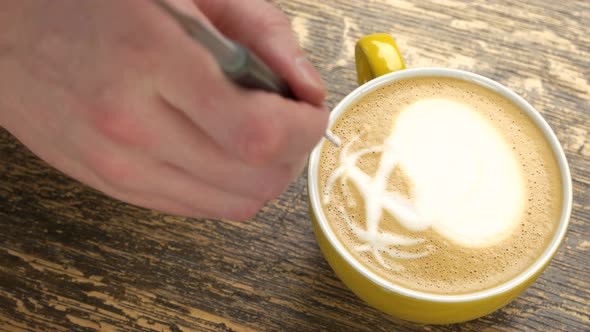 Hand of Barista and Coffee.