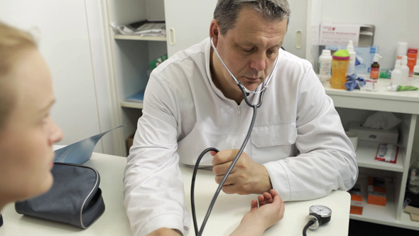 Doctor Measures The Blood Pressure alt