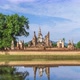Buddha statue and Pagoda at Wat Mahathat temple, Sukhothai Historical Park, Thailand - Time Lapse - VideoHive Item for Sale