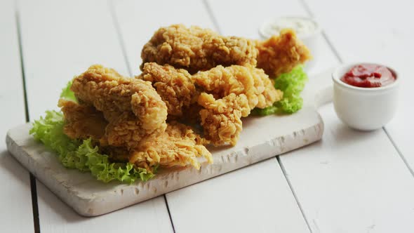 Fried Meat Laid on Chopping Board