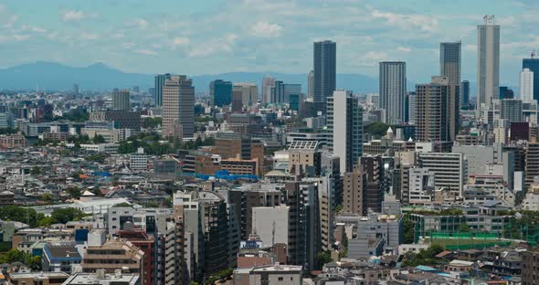 Tokyo city with sunny skyline