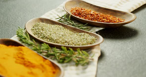 Various spices with herbs in a tray 4k