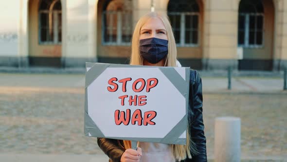 Young Woman Calling to Stop the War By Holding Steamer