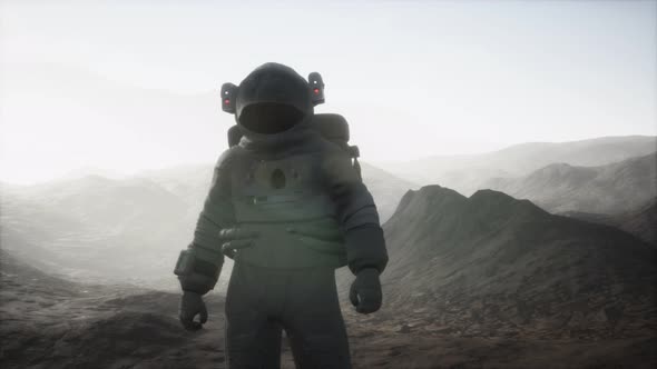 Astronaut on Another Planet with Dust and Fog alt