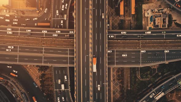 Sun at Top Down Traffic Cross Road Aerial