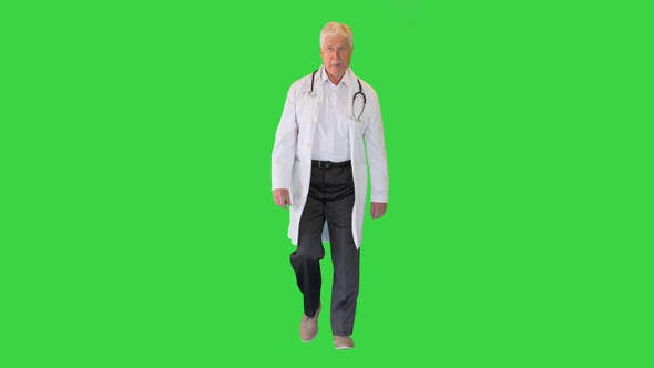 Old Male Doctor in Lab Coat Walking on a Green Screen, Chroma Key