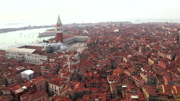 narrow canals and orange rooftops in Venice