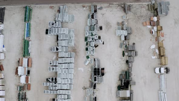 Aerial Top Drone View of the Outside Storage Open Warehouse of Loose Bulk on the Dry Mix Batch Plant