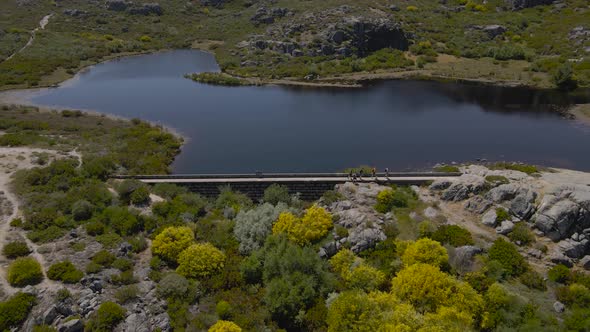 A drone pulls back from the Covão dos Conchos a manmade lake in the mountains of Portugal.