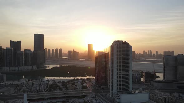 Sunset in Abu Dhabi Aerial View on Al Reem Island Surrounded By Modern Skyscrapers Between the