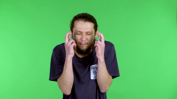 Caucasian Hopeful Excited Man Holds His Fingers Crossed and Makes a Wish Upset When It Does Not Come