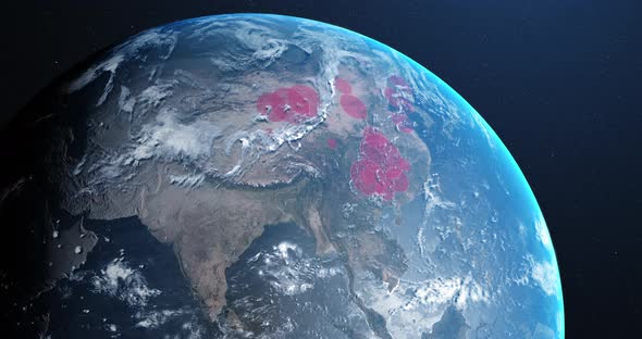 Animation of the planet earth spinning around and countries turning red through circles