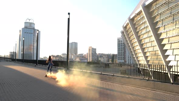 Young Woman Is Rollerblading.