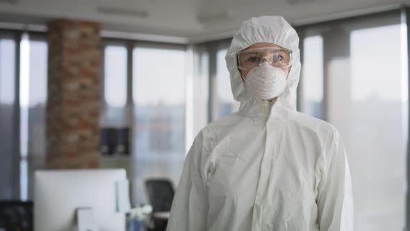 Video of technician in uniform before working during pandemic outbreak