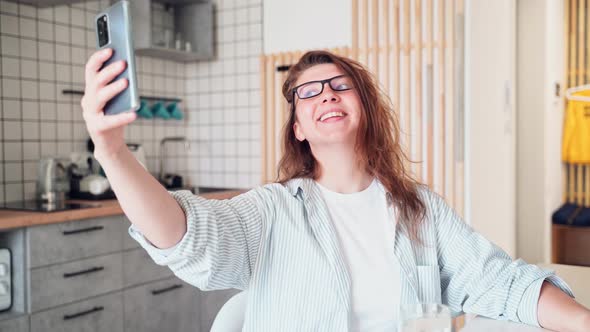 Young Woman Doing Self Portrait Indoors