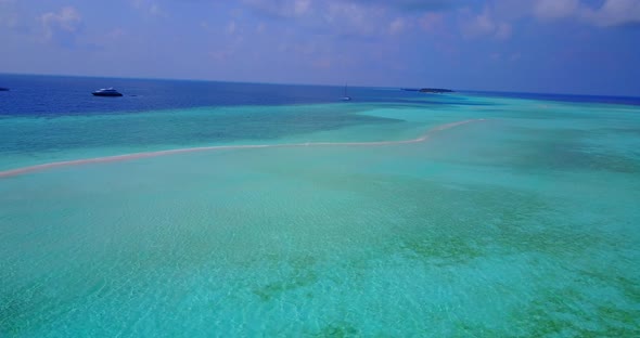 Luxury aerial travel shot of a summer white paradise sand beach and turquoise sea background in best quality